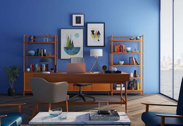 desk and chair in blue room