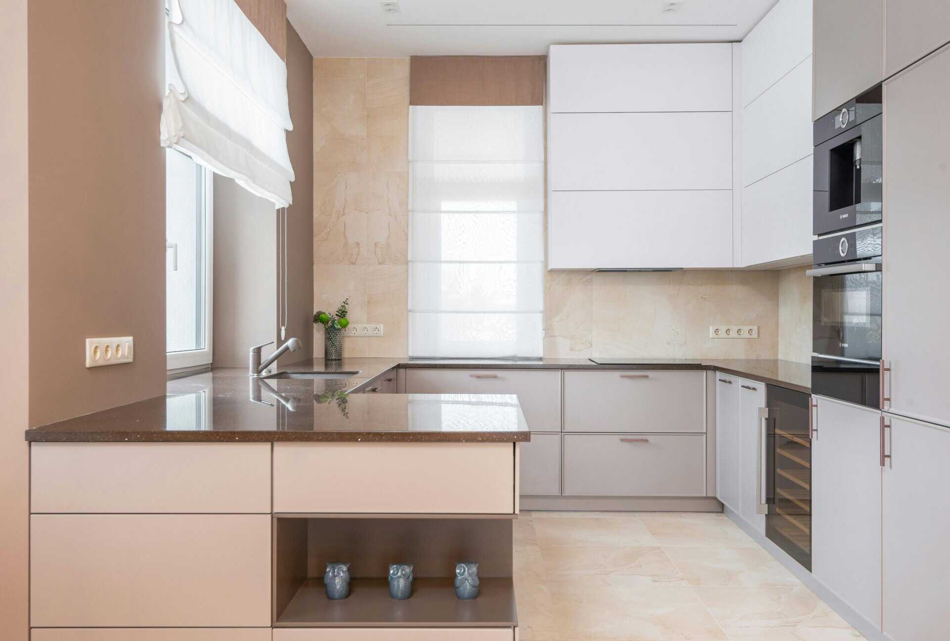 modern kitchen with white and light brown accents