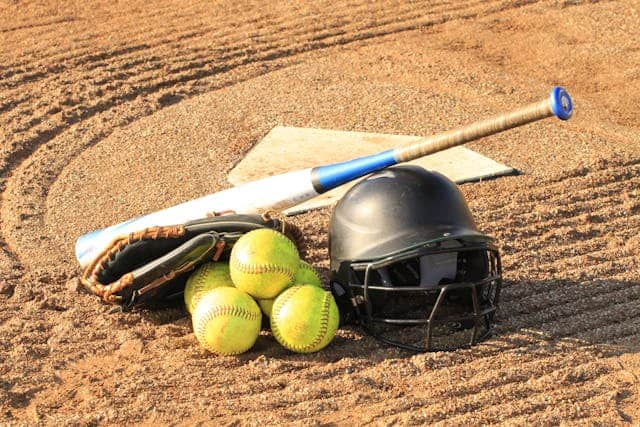 baseball equipment on sand