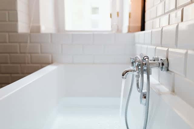 water filling a bath tub